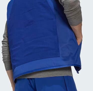 вебасто мокрый: Adidas. Водоотталкивающий и ветрозащитный пуховый жилет, способный — 5