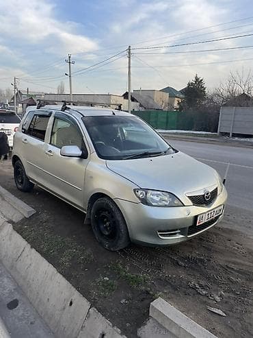 Mazda Demio: 2004 г., 1.3 л, Автомат, Бензин, Хэтчбэк