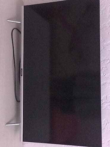 lg oled: Телевизор Philips, диагональ ориентировочно 40–43". Плоская панель с — 1