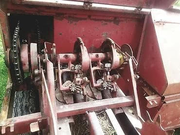 вакуумный компрессор: Пресс-подборщик New Holland модели 975, предназначенный для сбора и — 4