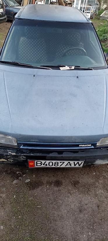 Mazda 323: 1990 г., Механика, Хэтчбэк