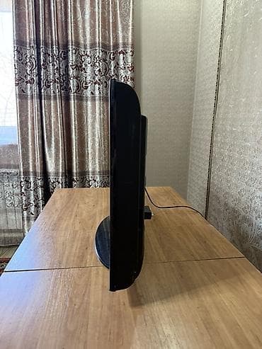 hp mini: Телевизор Samsung, серия LE32B450C4W (наклейка на корпусе). Диагональ — 2