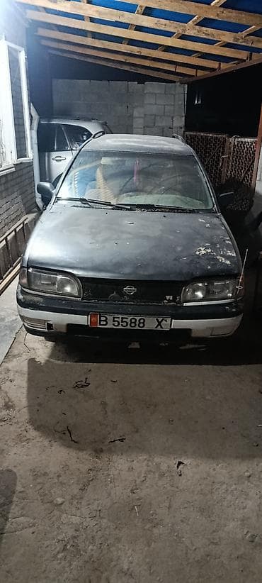 Транспорт: Nissan Sunny: 1995 г., Бензин, Седан — 1