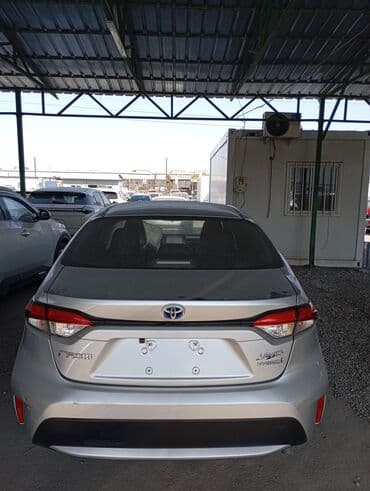 tayota runx: Toyota Corolla: 2020 г., 1.8 л, Автомат, Гибрид, Седан — 4