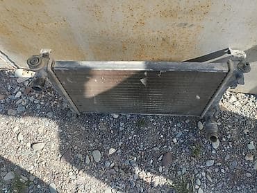 аналог: Радиатор охлаждения двигателя. МАЗДА 2 2003года 1.4куб.механика. в — 3
