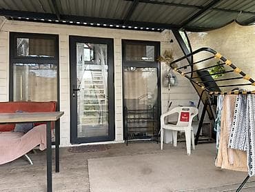 финский дом: Каркасный дом A-Frame с большой крытой террасой — 4