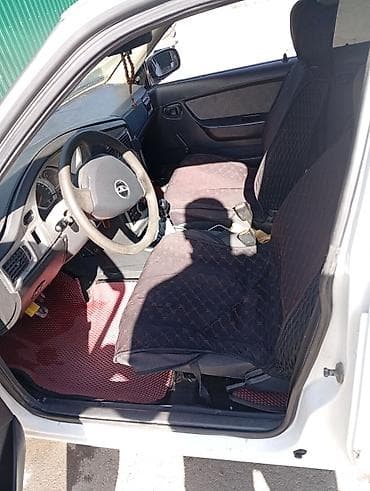 Daewoo Nexia: 2012 г., 1.5 л, Механика, Бензин, Седан