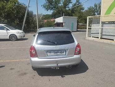 рейка на 210: Mazda 323: 2003 г., 1.5 л, Механика, Универсал — 2