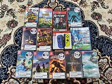 Видеоигры и приставки: Коллекция видеоигр и аксессуаров для Nintendo Switch и одна игра для — 1