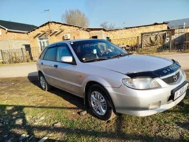 шины на гольф 2: Mazda 323: 2003 г., 1.3 л — 2