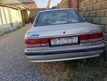 Mazda 626: 1999 г., 2 л, Бензин, Седан