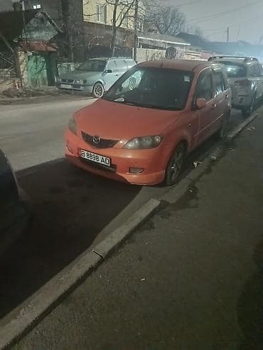 фары e39: Mazda 2: 2003 г., 1.5 л, Автомат, Газ, Хэтчбэк — 1