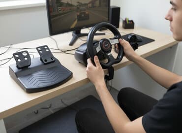 vr очки с контроллерами: Игровой руль с педалями Genius Комплект: - Руль Genius с панелью — 1