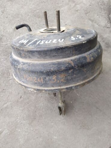 газовое оборудование на машину: Isuzu Trooper/Opel monterey Вакуумный усилитель тормоза, Исузу — 1