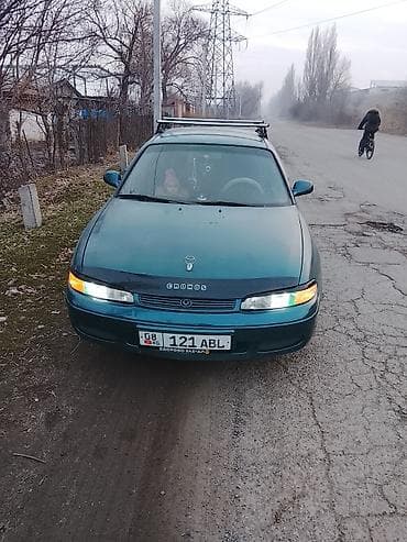 Mazda Cronos: 1992 г., 1.8 л, Механика, Гибрид, Седан