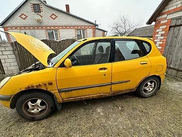 145 13: Daihatsu Sirion: 1998 г., 1 л, Механика, Бензин, Хэтчбэк — 6
