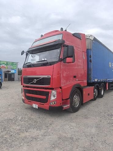 грузовики вольва: Тягач, Volvo, 2012 г., Шторный — 2