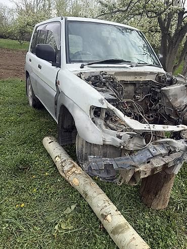 маз водовоз: Mitsubishi Pajero iO: 1998 г., Внедорожник — 7