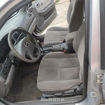 mazda 121: Mazda 626: 2001 г., 2 л, Автомат, Седан — 5