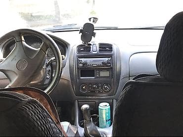 rx 7: Mazda 323: 2003 г., Ручные, Универсал — 5