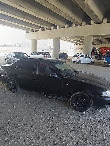 Daewoo Nexia: 2010 г., 1.5 л, Кол менен иштөөчү, Бензин, Седан — 4