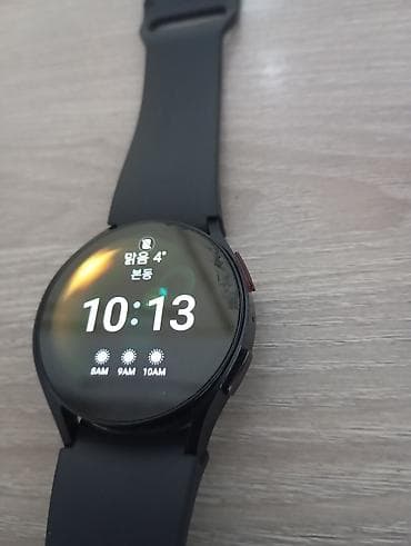 Аудиотехника: Смарт‑часы с круглым сенсорным дисплеем и черным силиконовым ремешком — 3