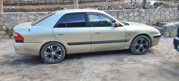 Водный транспорт: Mazda 626: 2000 г., Седан — 6