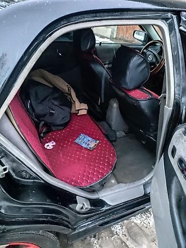 авто аксессуары: Mazda Protege: 2001 г., 2 л, Автомат — 8