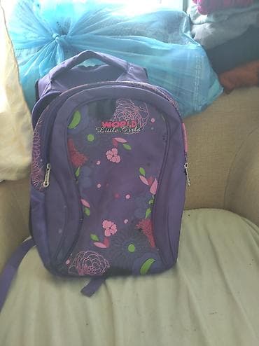 Другие сумки: Рюкзак для девочки World Little Girls, фиолетовый с цветочным принтом — 1