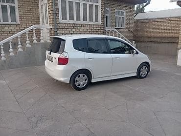 скутер электр: Honda Fit: 2005 г., 1.5 л, Автомат, Бензин, Хэтчбэк — 1