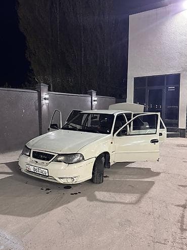 ровтер: Daewoo Nexia: 2013 г., Механика, Седан — 8