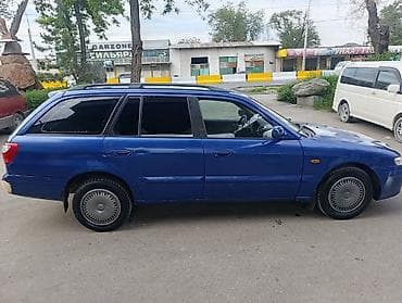 mazda 626 2001: Mazda 626: 2000 г., 1.8 л, Механика, Бензин, Универсал — 3