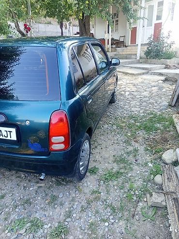 Daihatsu Cuore: 2003 г., 1 л, Механика, Бензин, Хэтчбэк
