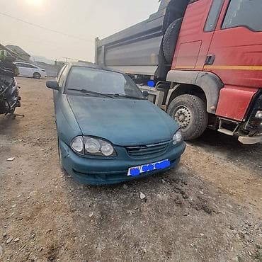 70 сом: Toyota Avensis: 1998 г., 1.6 л, Кол менен иштөөчү, Бензин, Седан — 6