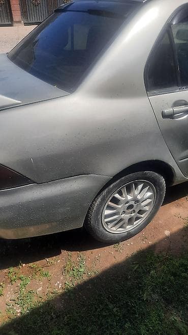 Унаа сатуу: Mitsubishi Lancer: 2001 г., 1.6 л, Кол менен иштөөчү, Седан — 8