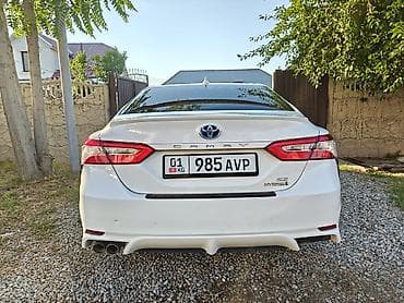 70: Toyota Camry: 2020 г., Гибрид, Седан — 7