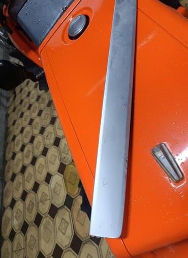 runx alex: Декоративные накладки Mazda, 2002 г. — 1