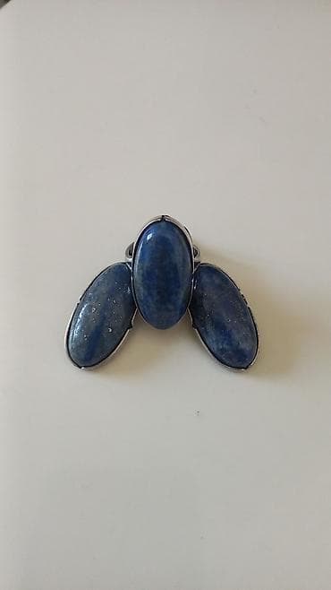 наручные чисы: Комплект украшений из металла с крупными овальными кабошонами. Размер — 2