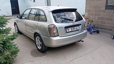jetta volkswagen: Mazda 323: 2002 г., 1.6 л, Механика, Бензин, Хэтчбэк — 3