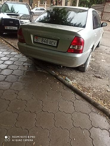 Mazda: Mazda Familia: 2002 г., 1.6 л, Механика, Бензин, Седан — 4