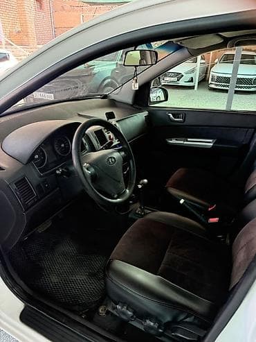 сити гого: Hyundai Getz: 2010 г., 1.6 л, Механика, Бензин, Хэтчбэк — 5