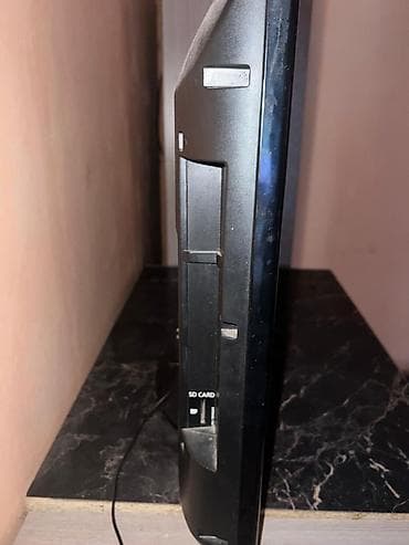 телевизор нес: Телевизор Panasonic VIERA, диагональ около 26–32". ЖК-панель с — 2