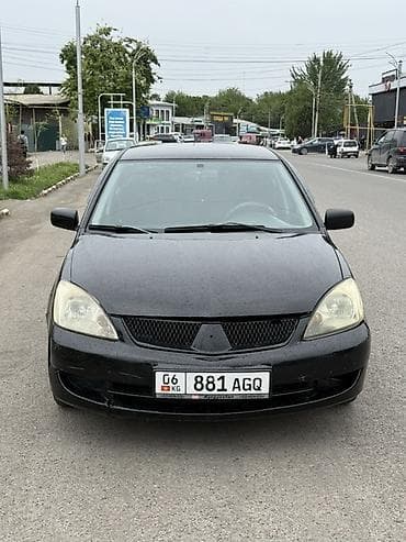 camry 2010: Mitsubishi Lancer: 2006 г., Автомат, Бензин, Седан — 1