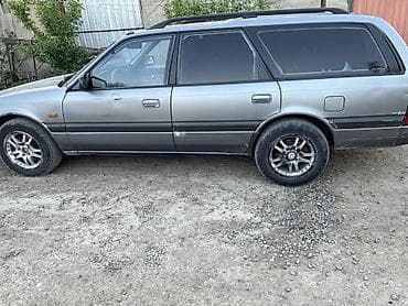 Mazda 626: 1993 г., Универсал