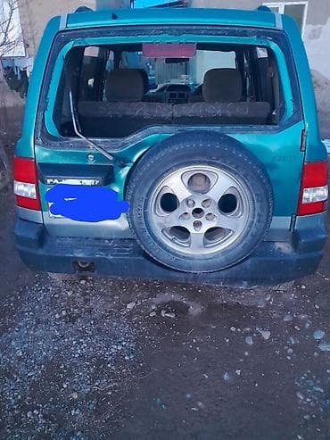 mini v: Mitsubishi Pajero iO: 1998 г., Бензин, Внедорожник — 3