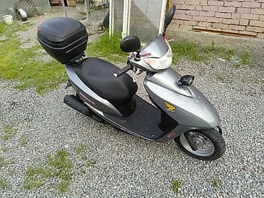 dio 27 af27: Скутер Honda (серия Dio) в серебристом цвете. Характеристики и — 3