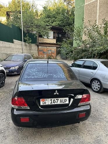 daewoo matiz 0 8: Mitsubishi Lancer: 2005 г., 1.6 л, Автомат, Бензин, Седан — 1