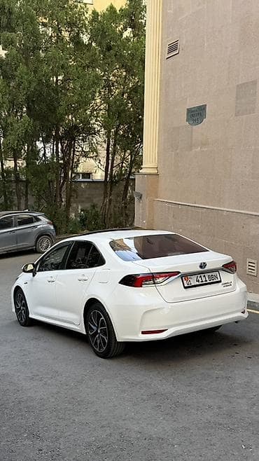 corolla e120: Toyota Corolla: 2020 г., 1.8 л, Автомат, Гибрид, Седан — 4
