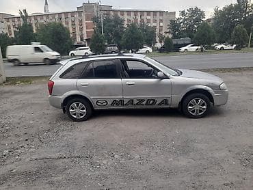 e 303: Mazda 323: 1999 г., 1.5 л, Автомат, Бензин, Универсал — 5