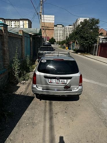 byd e7: Ford Focus: 2001 г., 2 л, Механика, Бензин, Универсал — 6